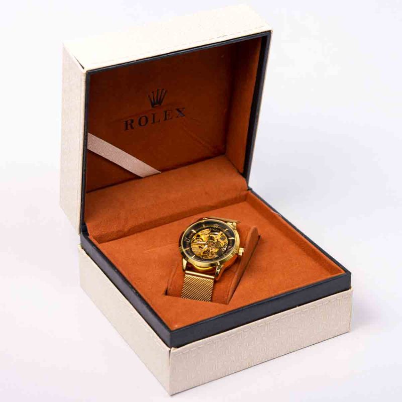 Rolex 25 Jewels, Golden Strap, Black Transparent Dial Watch form Women